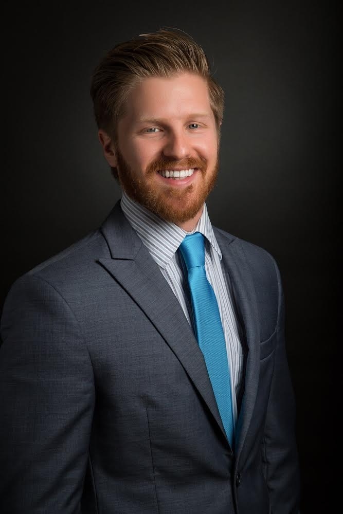 Logan, Co-Founder and Principal of Blue Anchor Property Management